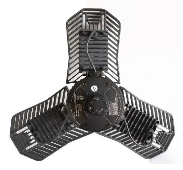 Waterproof industrial foldable garage LED flood light with aluminium housing in workshop setting