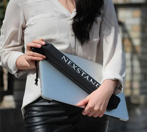 Black folding portable laptop stand with reinforced nylon construction showing adjustable height mechanism