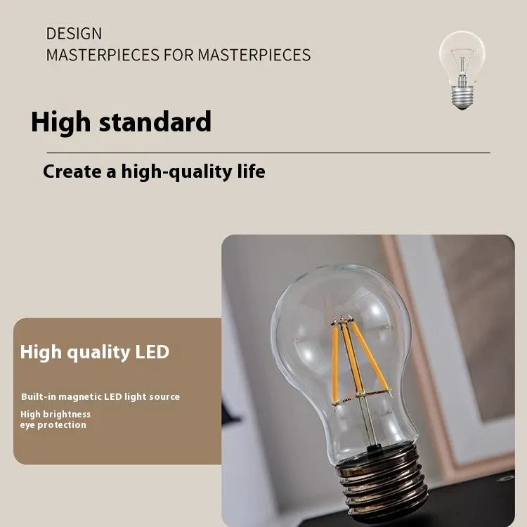 Suspension bulb desktop night lamp with iron art construction and black wood grain base