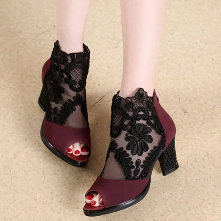 Black lace women's Gladiator sandals with a square high heel and peep toe on a zip closure