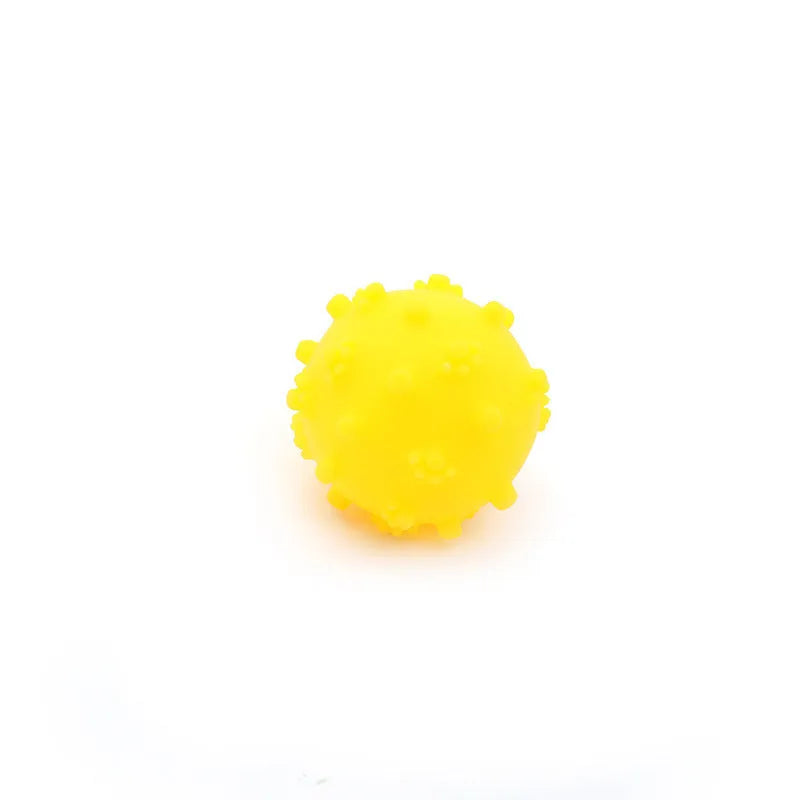 Four bright coloured spiky dog balls with paw print dimples, 2-inch diameter for small breed puppies