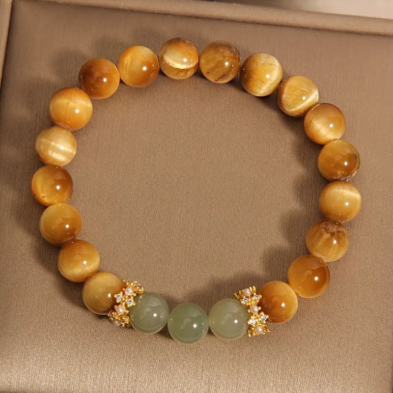 Natural yellow Tiger's Eye stone bracelet with Hetian jade accents in simple design