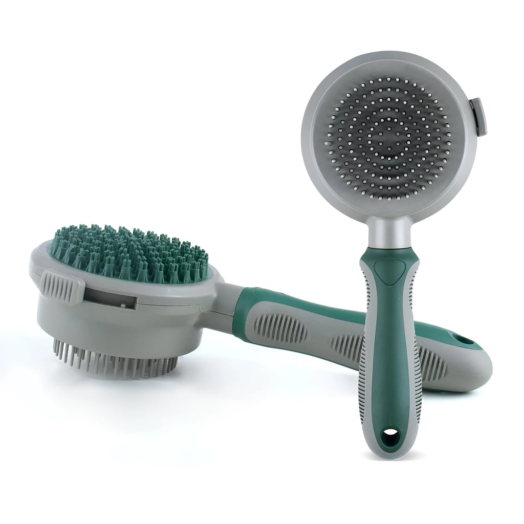 Green and pink dual-sided silicone pet grooming brush with retractable slicker and octopus-toothed massager.