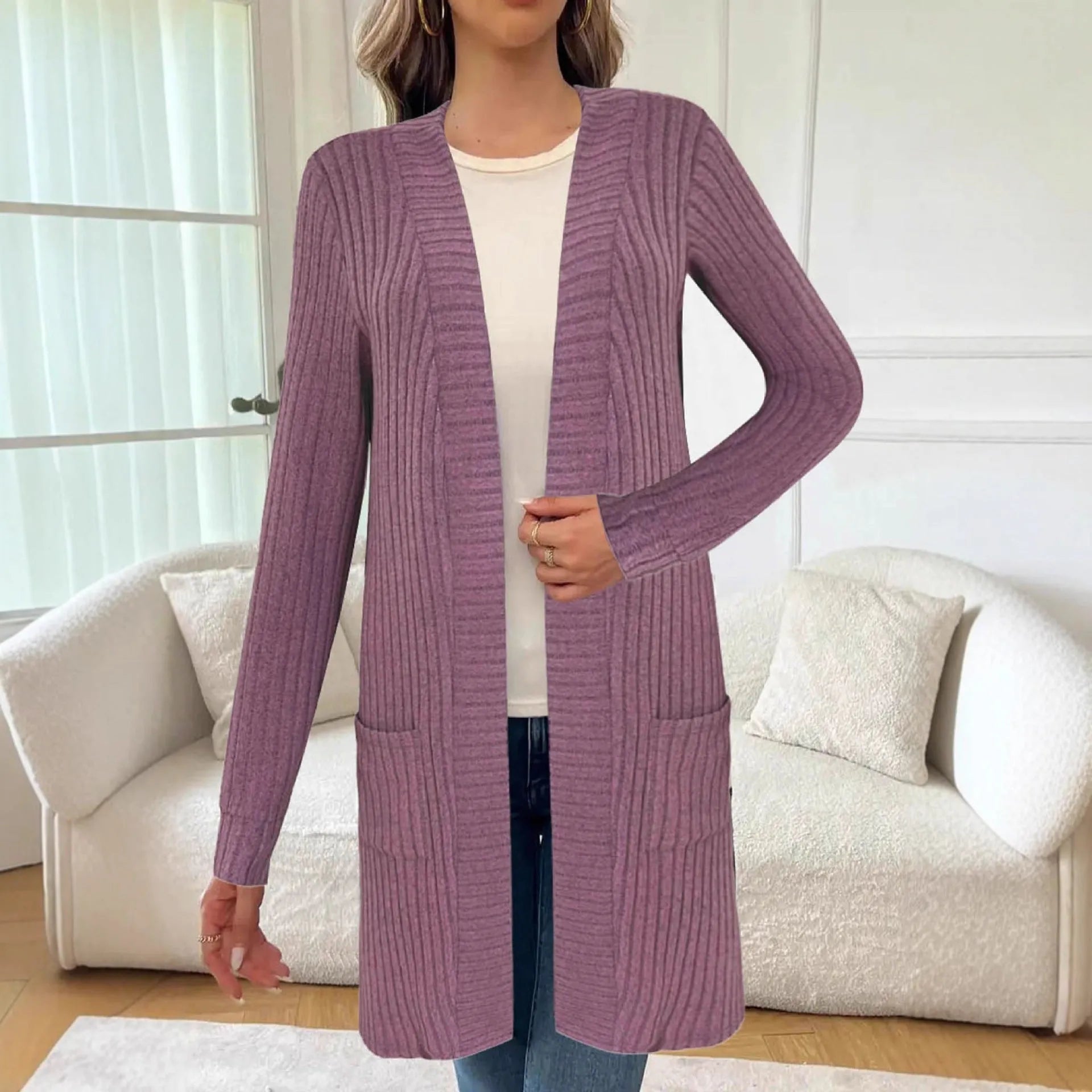 Long sleeve knitted cardigan jacket in black colour with loose pockets and regular sleeves
