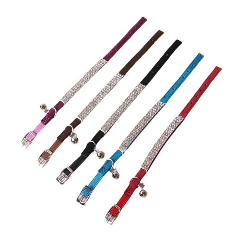 Soft flocking cat collar with an elastic buckle shown in one of six available colours.