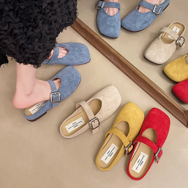 Women's flat closed toe half slippers in apricot, blue, red, or yellow with a square toe and rubber sole.