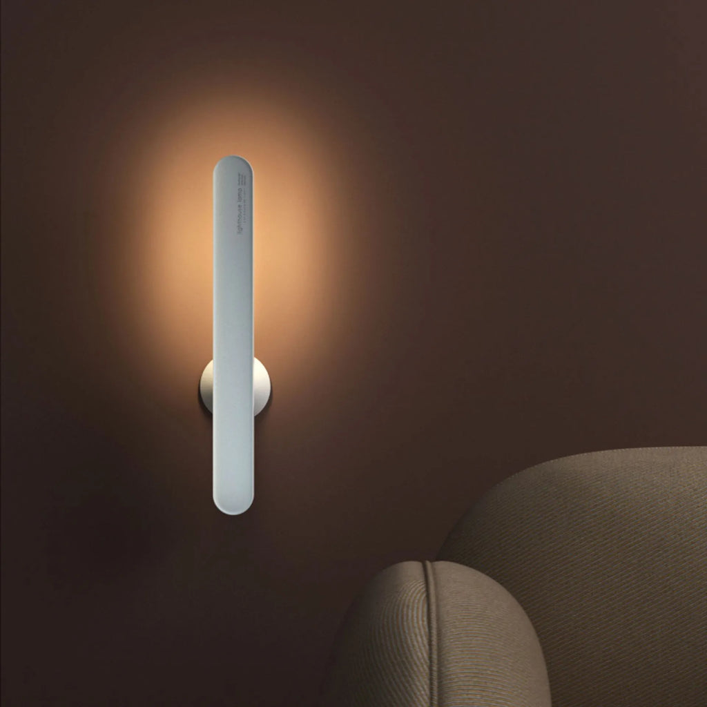 Geometric desk lamp with magnetic suction showing touch switch and USB power connection