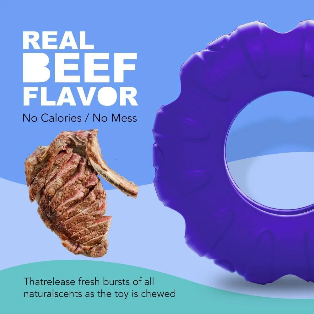 Blue rubber tyre-shaped dog chew toy with six oval openings for treat dispensing