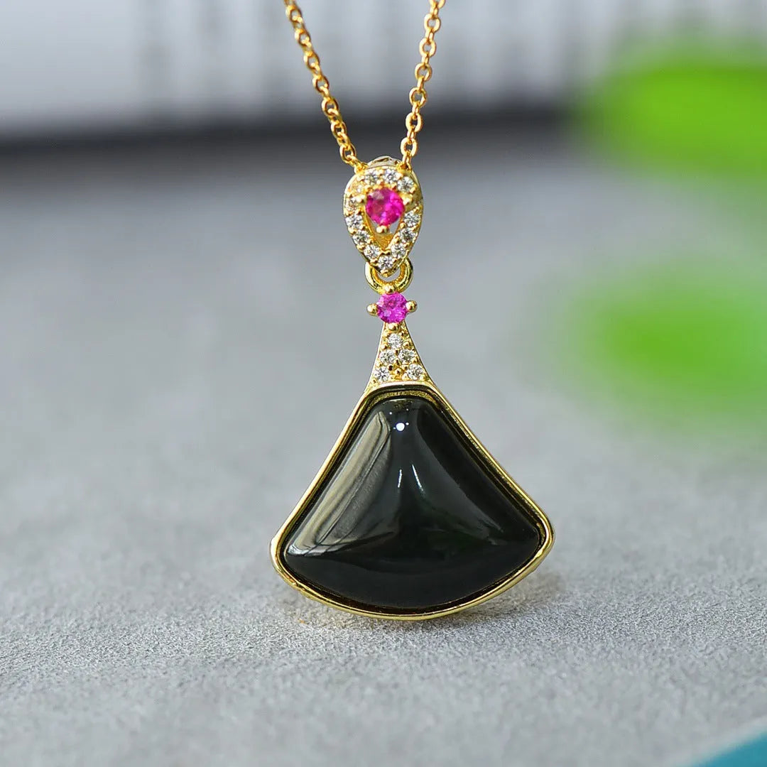Modern natural Hetian grey jade pendant with copper inlay and ink-blue jade accents on a necklace chain.