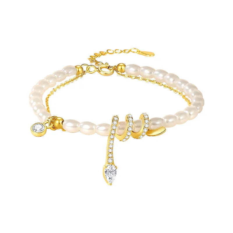 Pearl snake classic style bracelet in 925 silver with gold or white gold plating, featuring zodiac snake and geometric design
