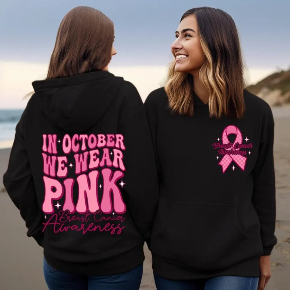 Pink Breast Cancer Awareness pullover hoodie with retro art print and side seam pocket.