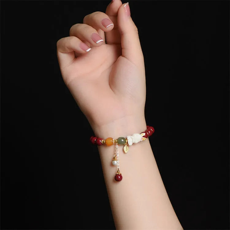 Women's natural beeswax and purple gold sand bracelet with cinnabar rabbit charm