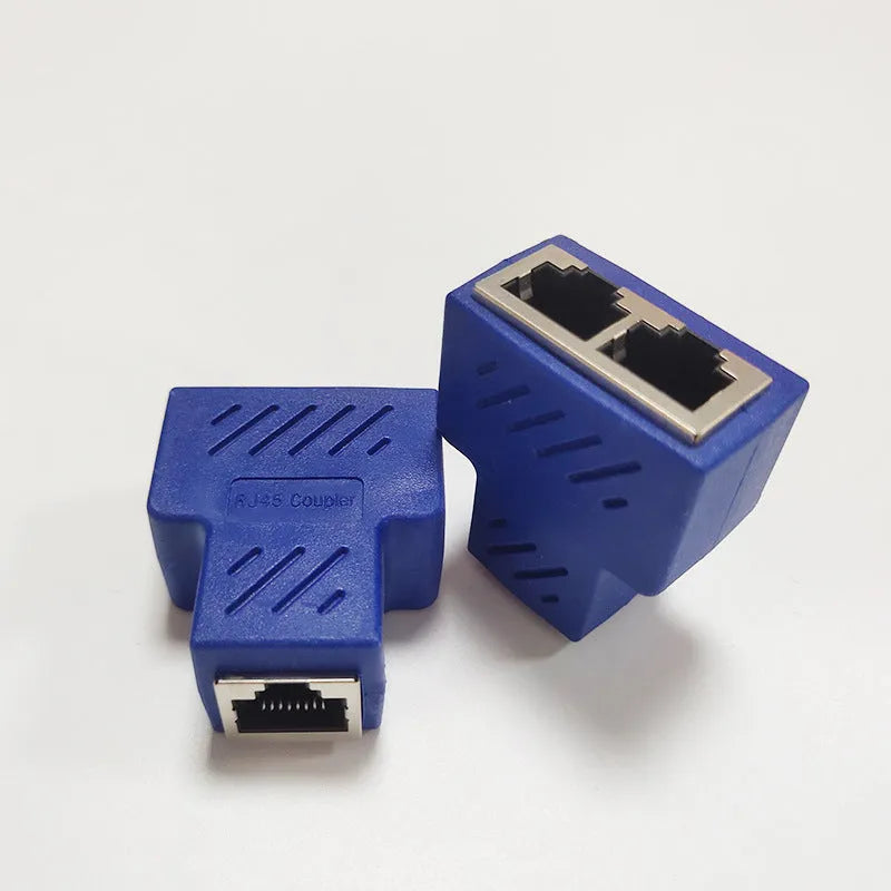 Two white RJ45 network cable splitters, showing one input and two output ports.
