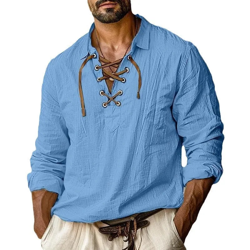Men's loose fit long sleeve linen blend shirt in blue with a lapel collar, laid flat.