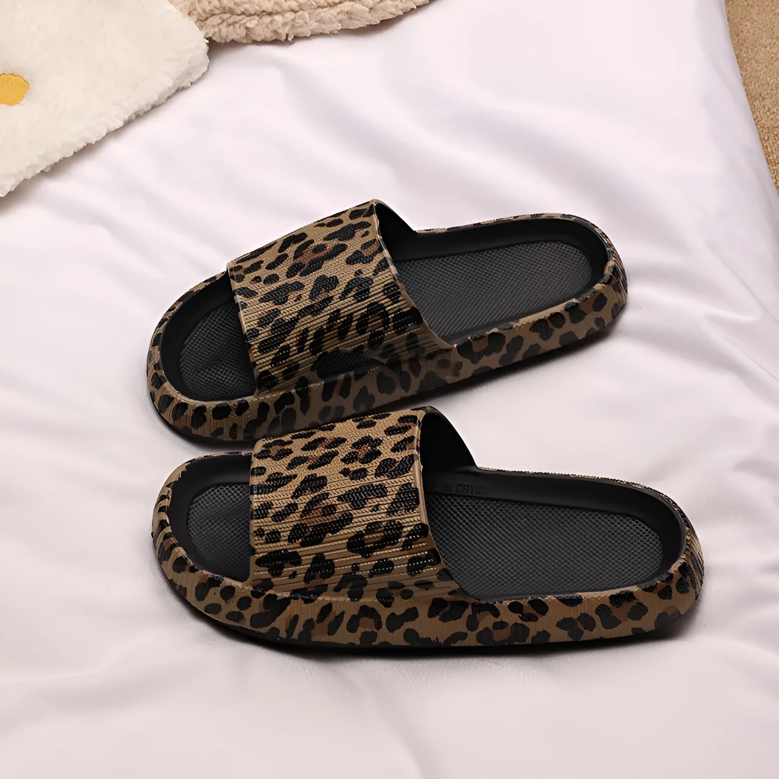 Leopard print slippers with thick EVA sole in various animal pattern colours