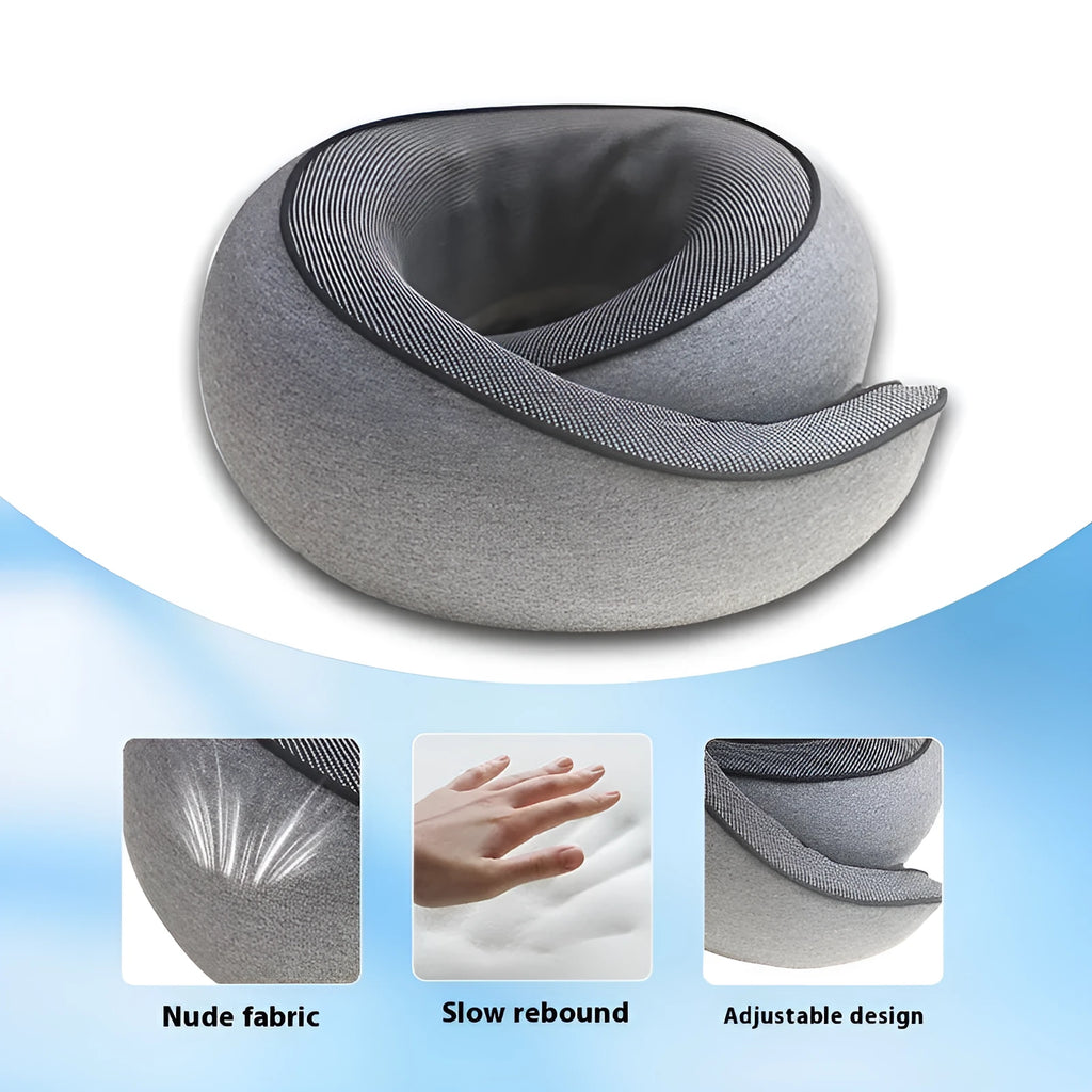 A grey U-shaped memory foam travel neck pillow with a storage bag, shown on a plain background.