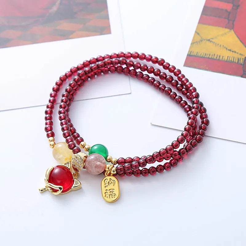 Purplish red garnet fox charm bracelet with adjustable rope closure for women