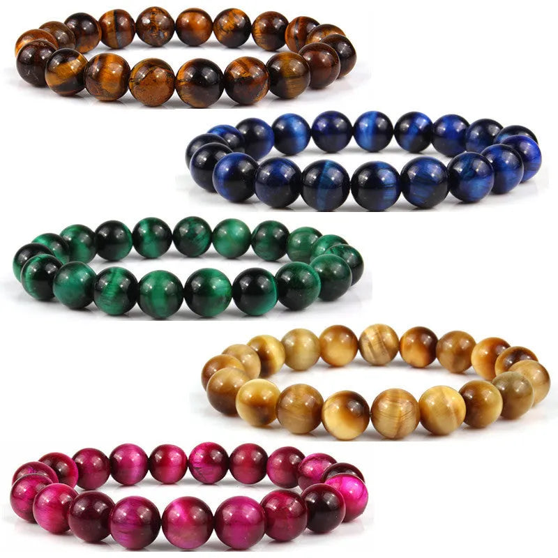 Natural tigereye crystal beaded bracelet with round beads, shown in a selection of colours and sizes on a wrist.