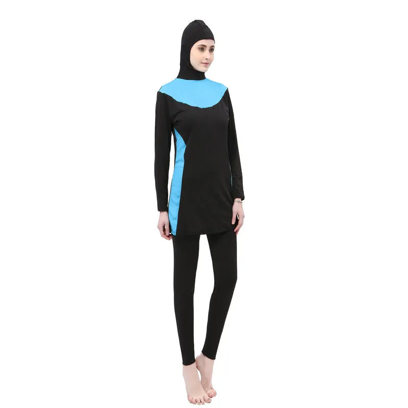 Women's black hooded long sleeve swimsuit top and pants for conservative swimming.