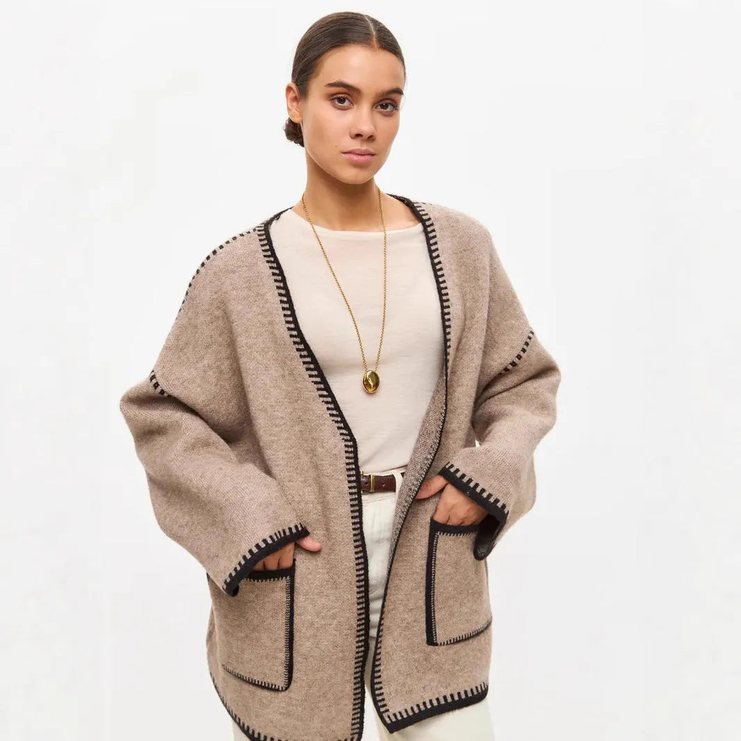 Loose fit knitted cardigan with lace-up front detail in thick imitation cashmere cotton fabric.