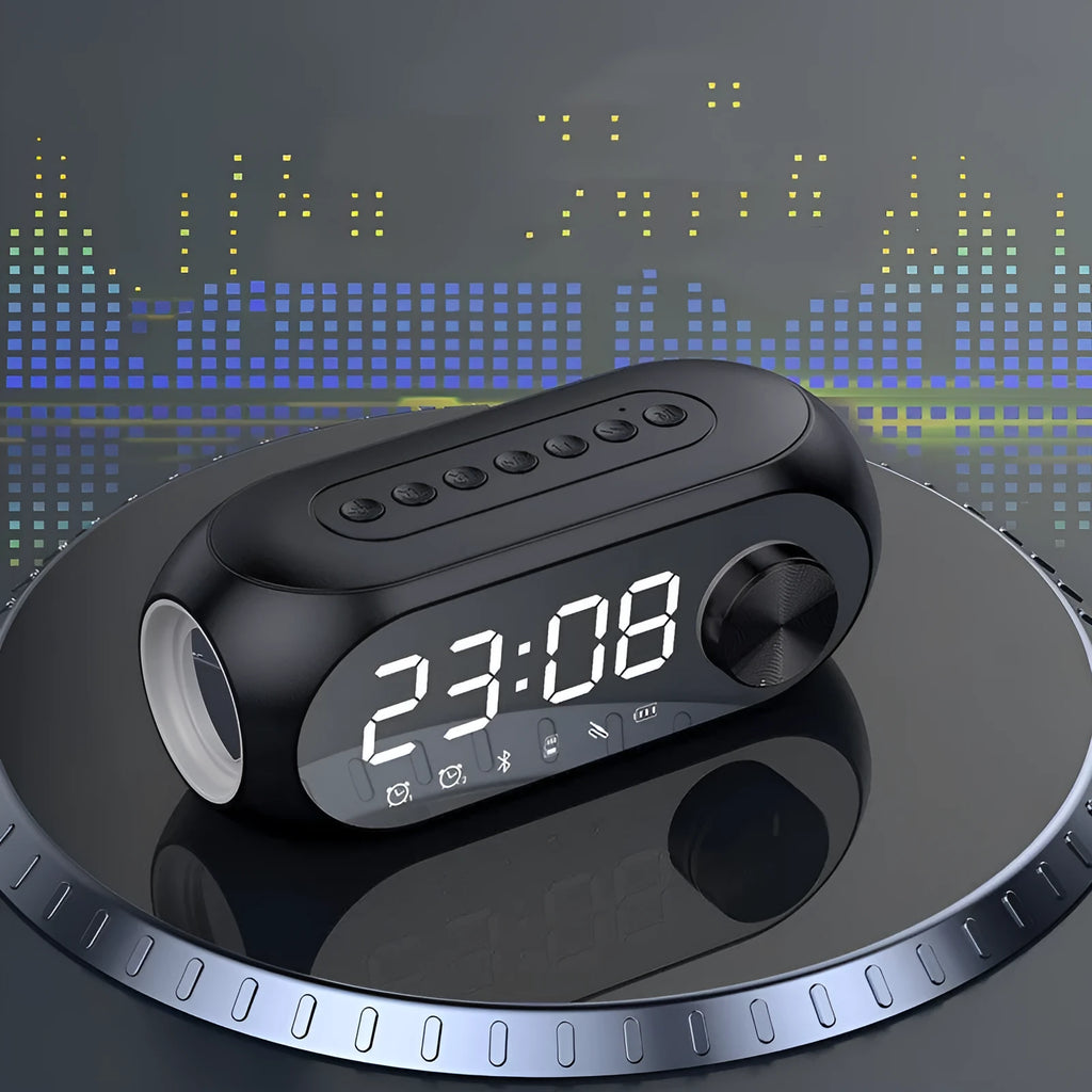 S8 Black portable mini clock and Bluetooth speaker with extra bass on a desk, connected via USB cable.
