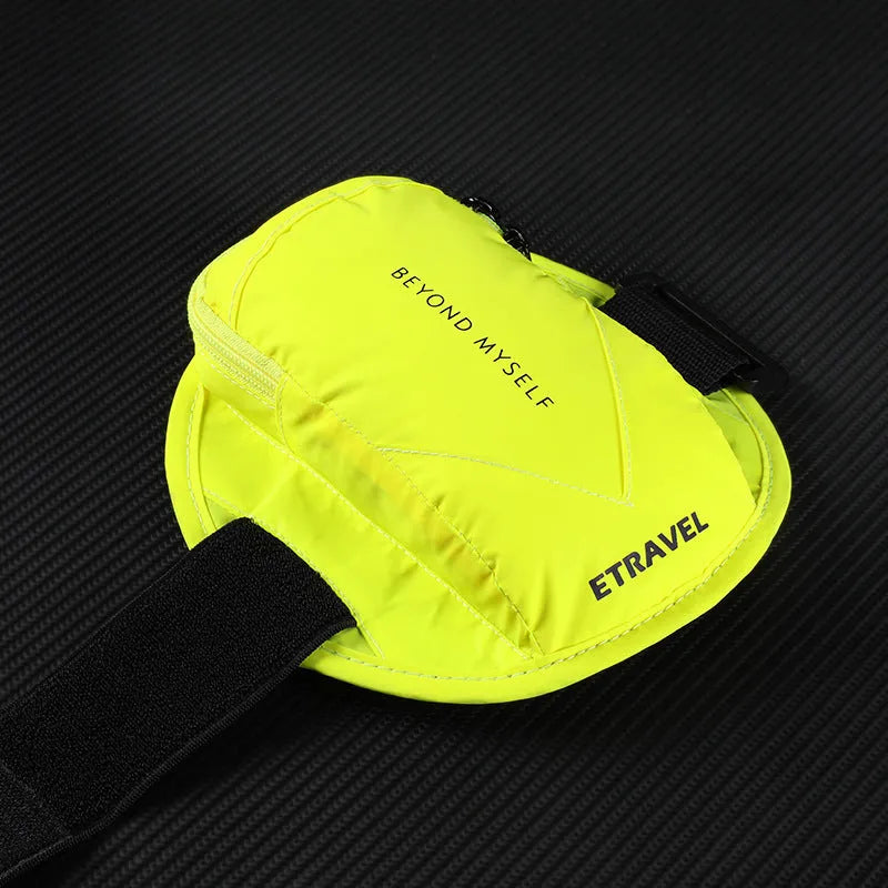 Reflective black running arm band with adjustable strap, shown holding a smartphone.