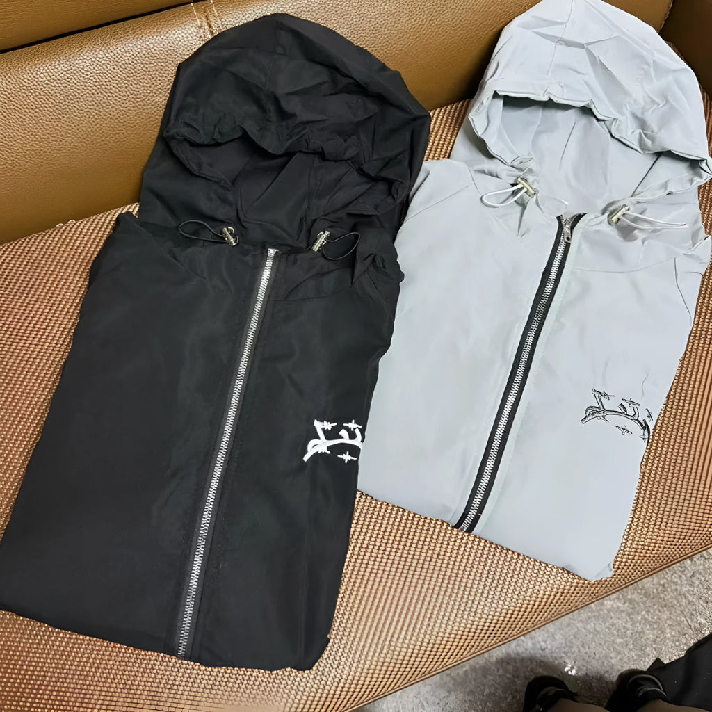 Men's loose fit grey hooded sunscreen jacket showing front view with polyester fabric texture detail