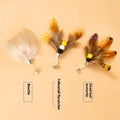 Three steel wire cat toy replacement heads with insect designs for teaser wands