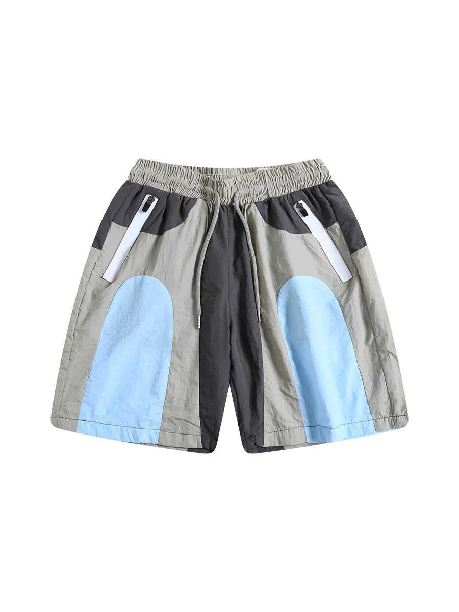 Blue patchwork quick-drying men's beach shorts with loose straight-leg fit for outdoor sports