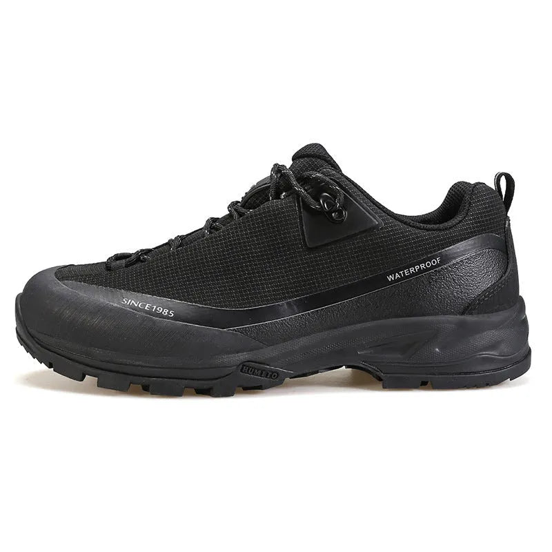 Low-top mountain climbing shoes with leather mesh upper and non-slip rubber sole in black-red and beige-maroon colour options for men and women.