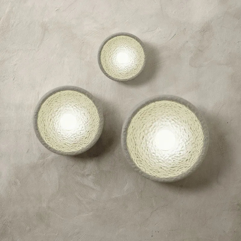 Japanese minimalist wall lamp with round resin shade in warm white light