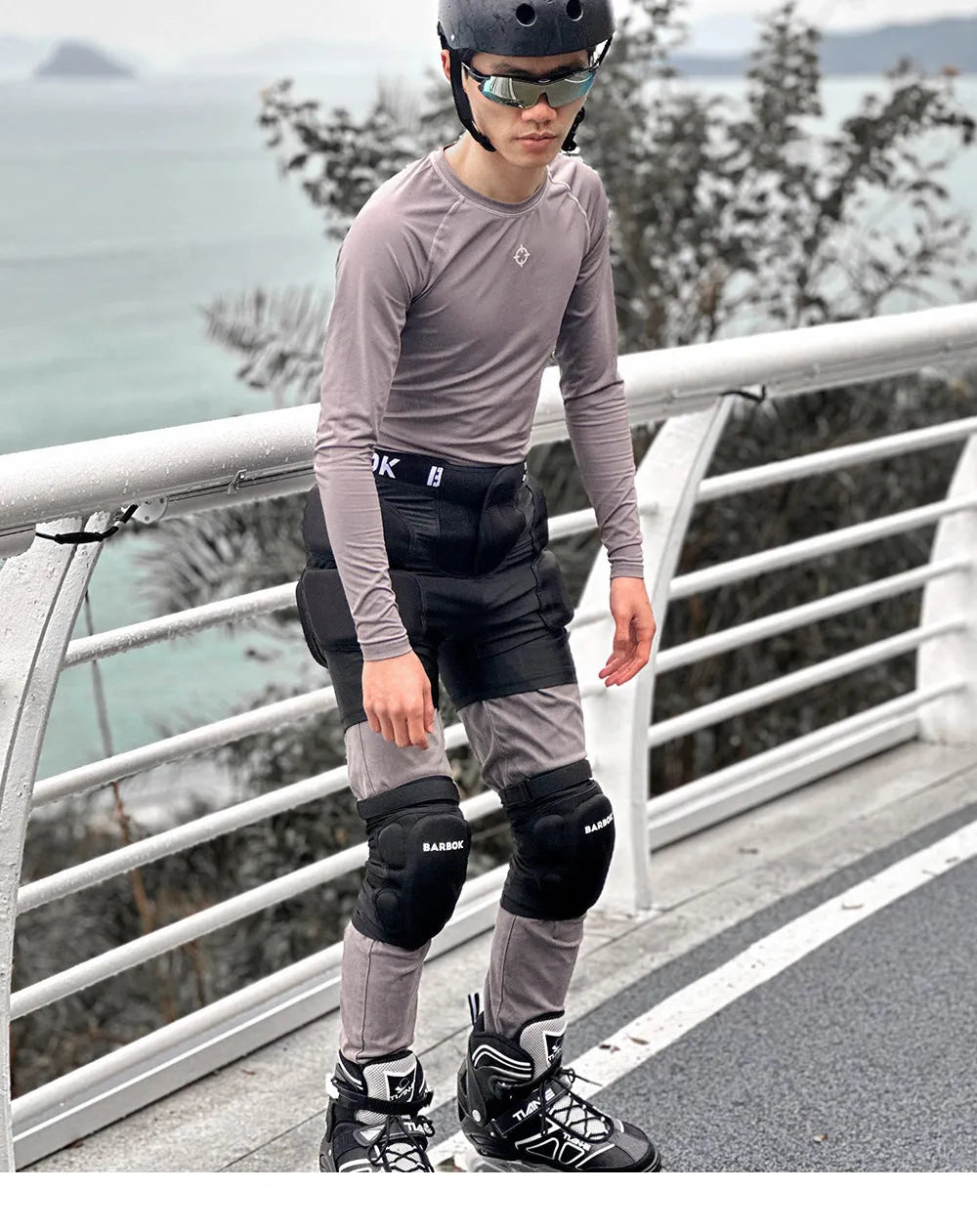 Black adult hip protection pad with NBR foam for roller skating and skateboarding safety.