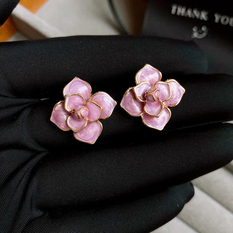 Purple oil-spot glaze flower stud earrings with gold plated silver needle elements on copper base