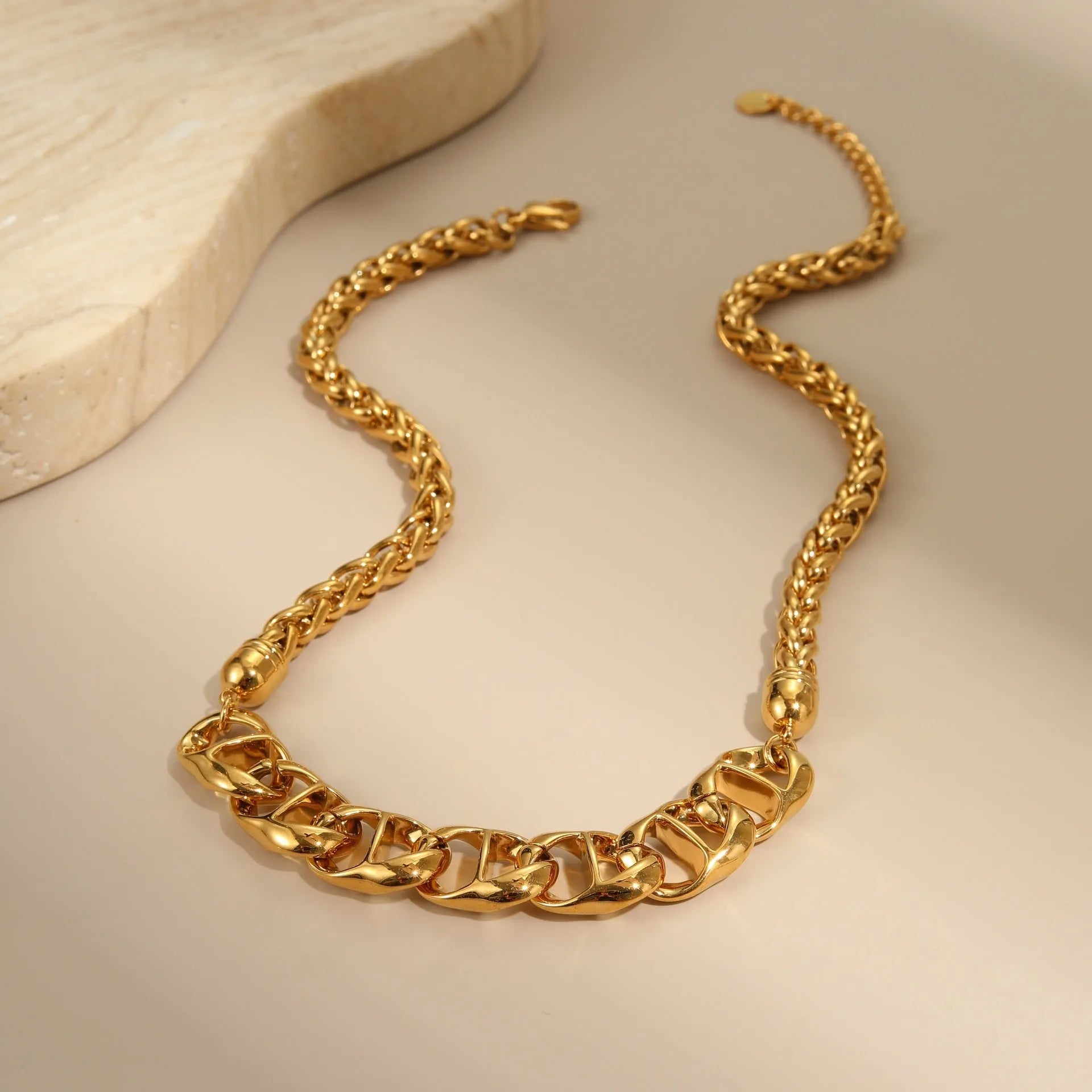 Gold plated stainless steel necklace with geometric pendant on regular chain for women