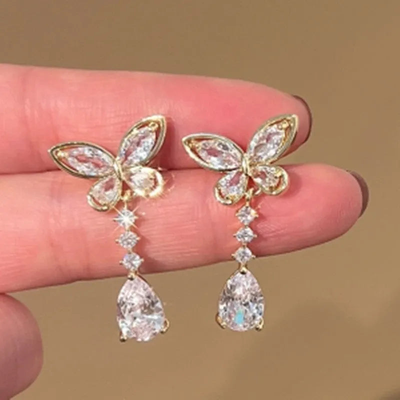 Platinum colour bow stud earrings with zinc alloy construction and electroplating treatment