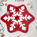 Christmas-themed printed polyester carpet in a round pad design on a hardwood floor.