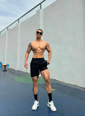 Men's ice silk quick-drying double-layer shorts in quarter-length casual style