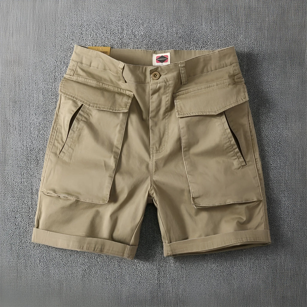 Men's straight-leg cargo shorts in Army Green made from micro-elastic cotton fabric with multiple pockets.
