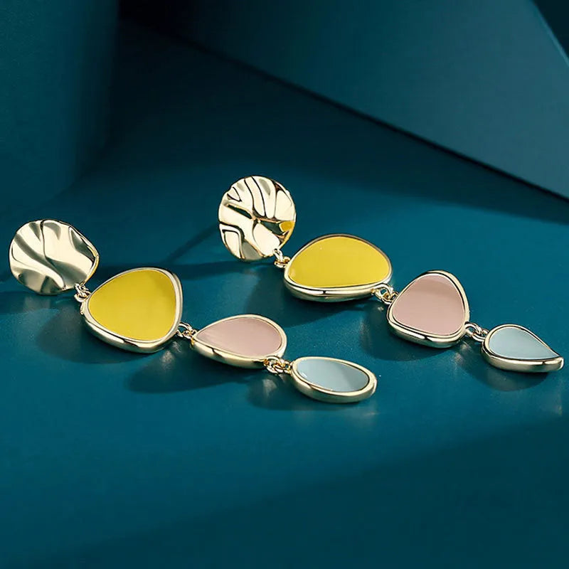 Morandi three-colour oil-dripping disc earrings with sterling silver needle on white background