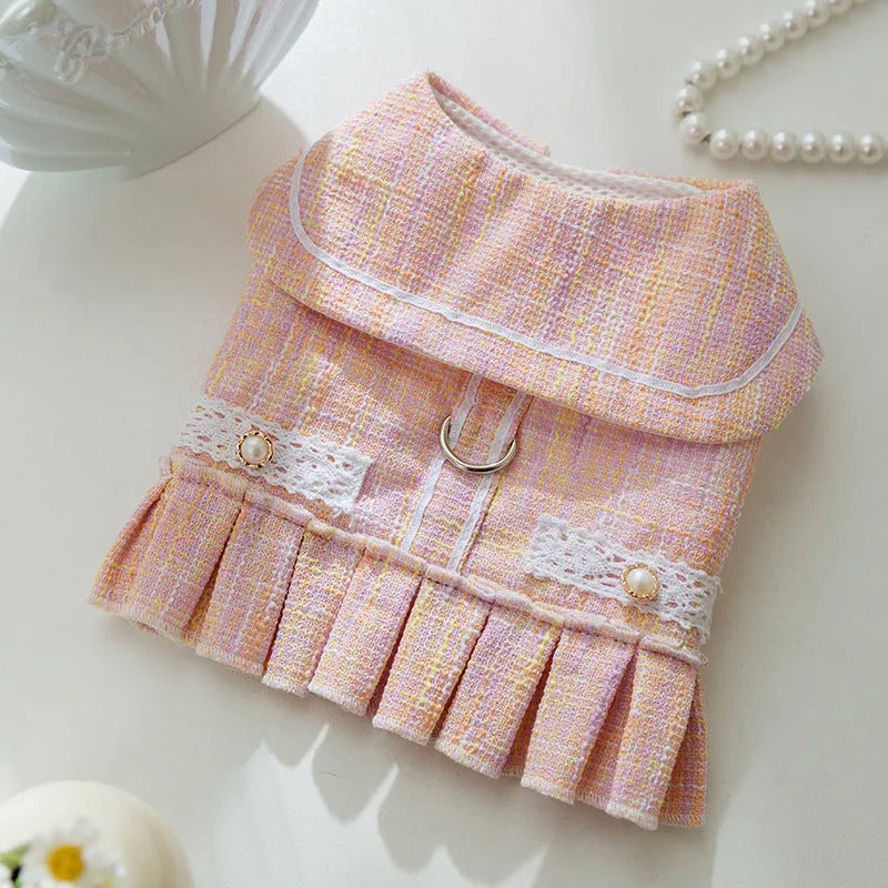 Pink and purple pet clothing garment for a cat or small dog on a white background.