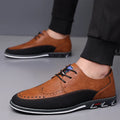 Men's casual leather shoes in black with rubber sole, low top, and leather toe cap.