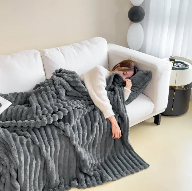 Soft Wind bubble faux rabbit fur blanket in caramel colour showing double-sided thickening texture