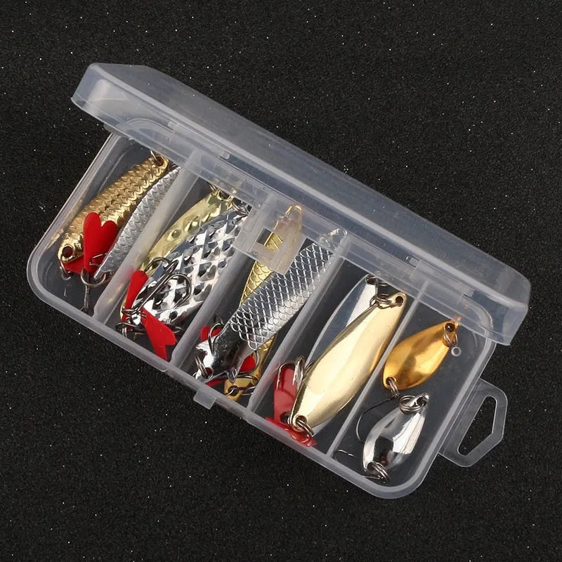 Box of pineapple sequin fishing lure crafting components with metal sequins and multi-colour fabric.