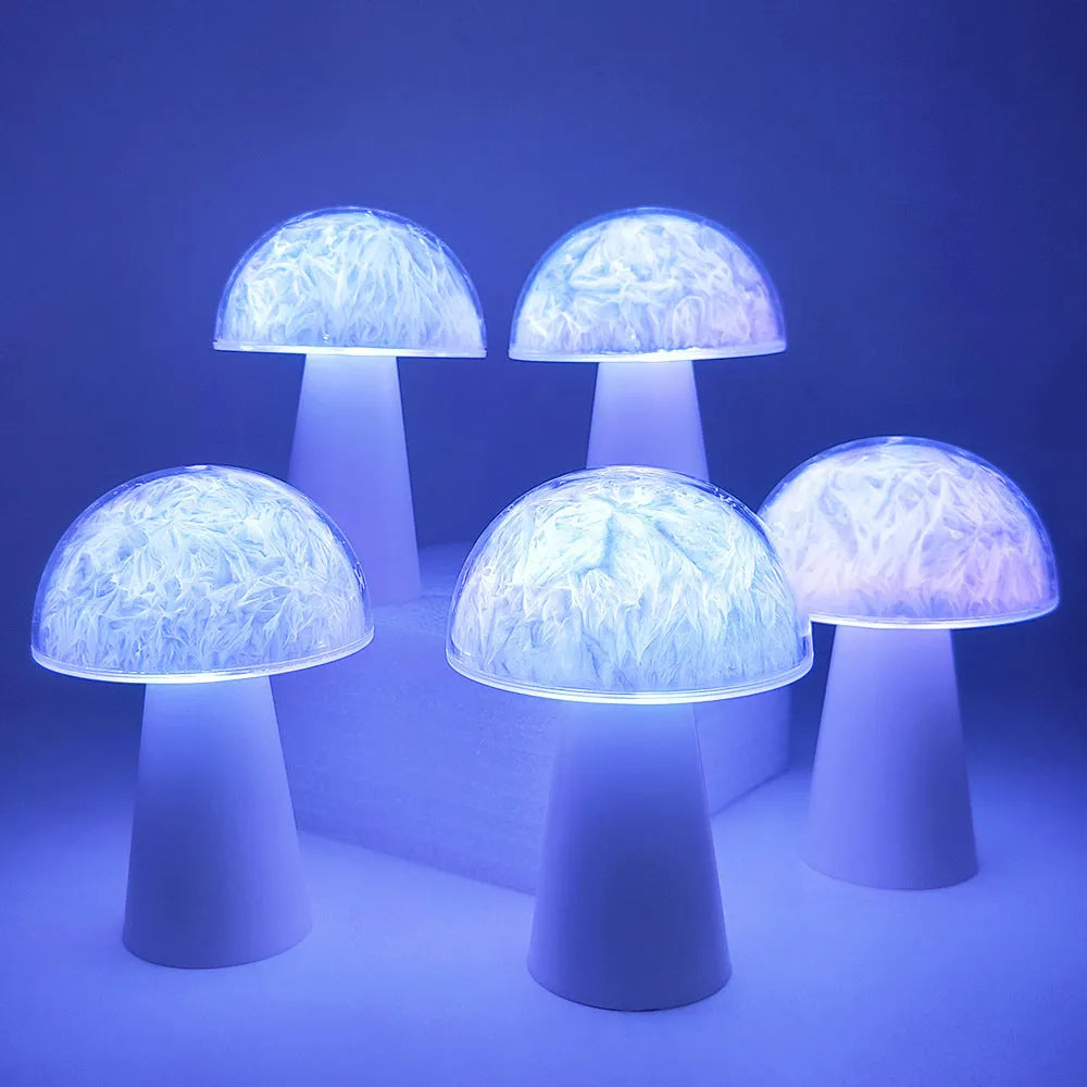 Mushroom-shaped RGB colour-changing night light with remote control on wooden surface