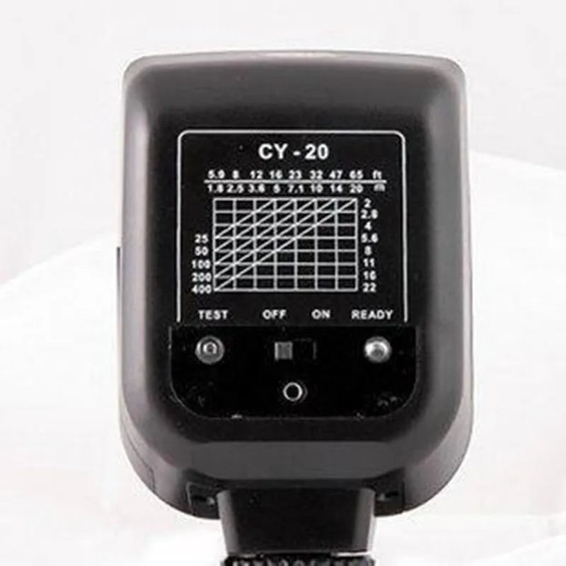 Compact silver SLR camera flash with a rotating head on a hot shoe mount