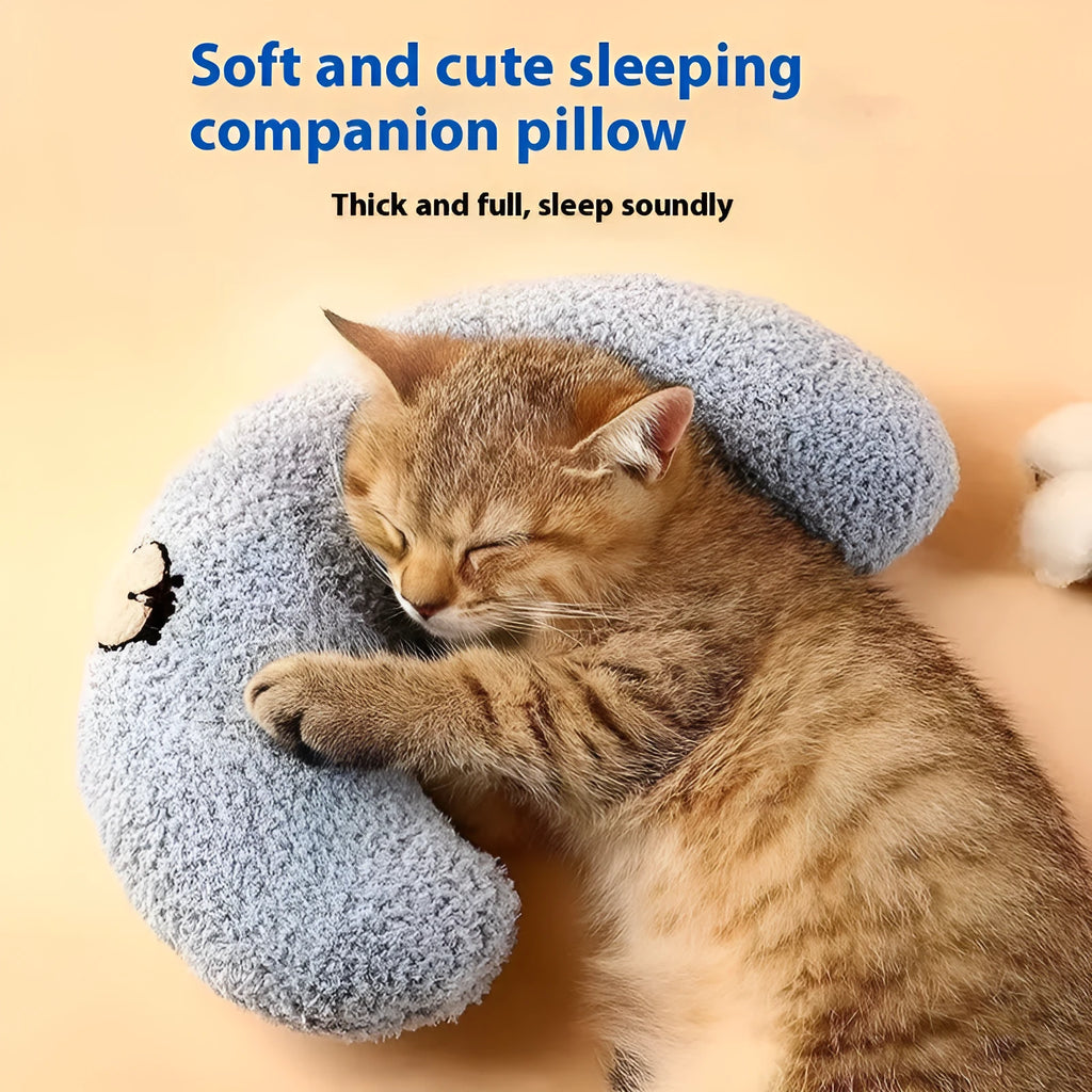 Blue U-shaped cat pillow with neck support design next to yellow question mark pet pillow