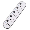International power strip with sockets for UK, US, EU and AU plugs, a switch, and USB ports.