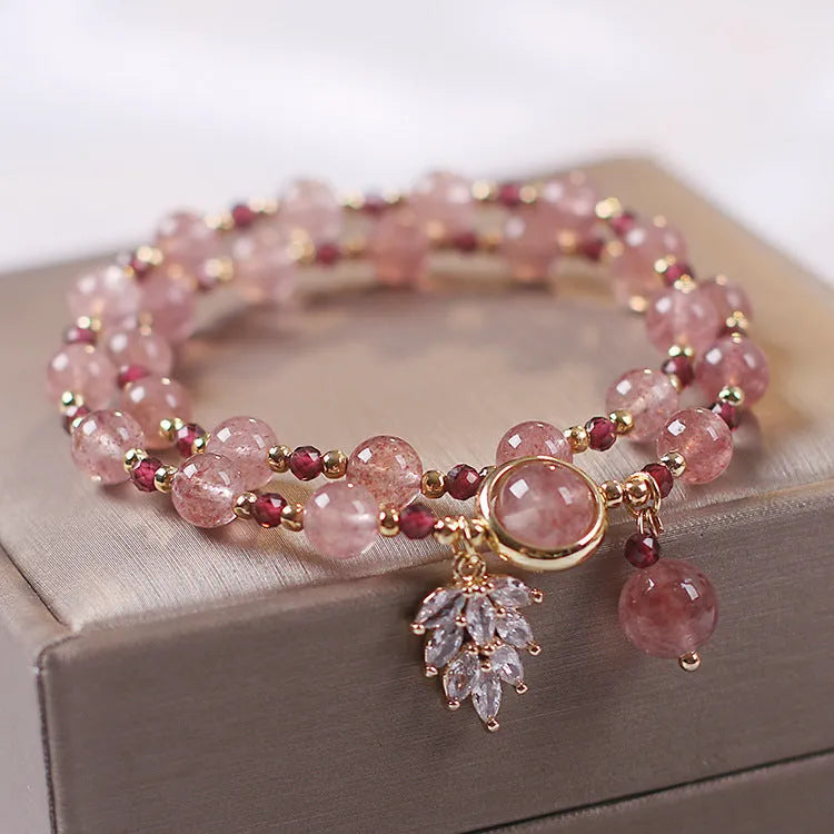 Double layer strawberry quartz bracelet with lucky cat charms and red cat's eye flower beads
