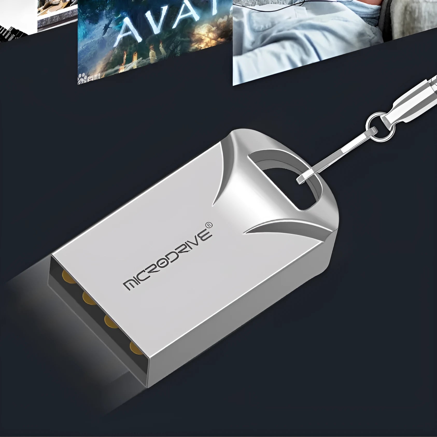 Small black and silver metal USB flash drive showing size comparison