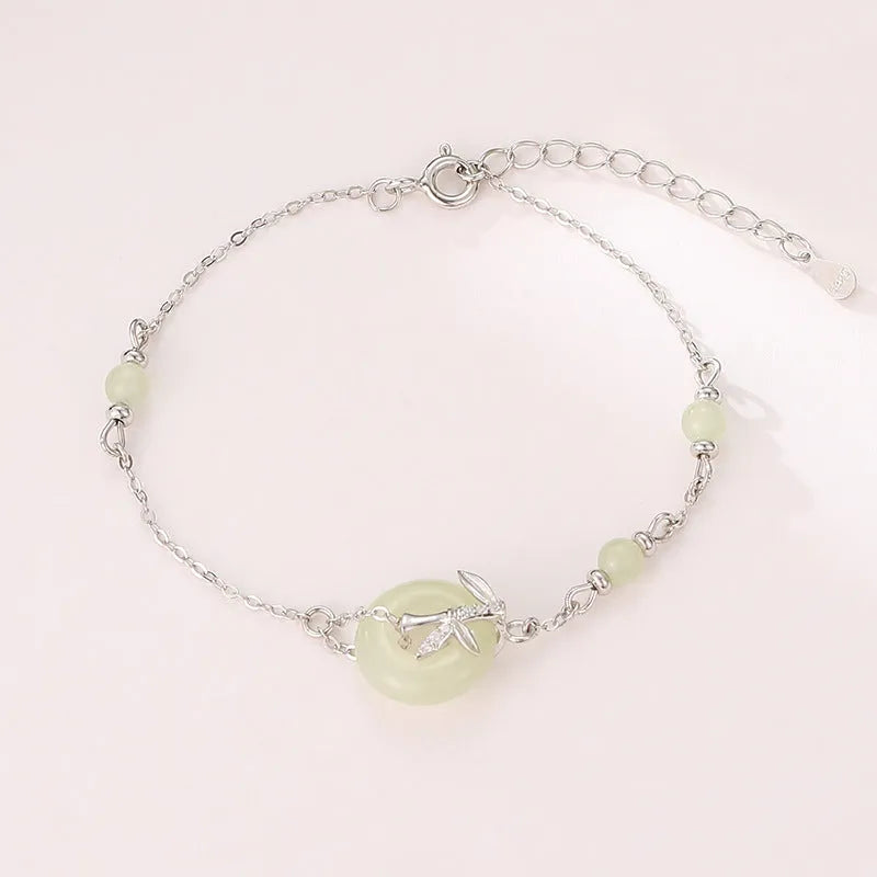 Women's Hetian Jade safety buckle bracelet in antique style with peace buckle detail